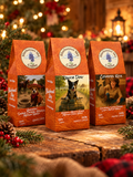 Gather ’Round 3-Bag Holiday Bundle of three orange coffee bags with illustrated cowboy and ranch dog designs and branded cream labels.